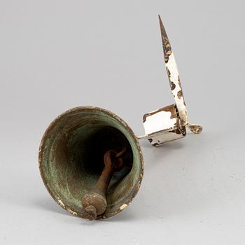 A bronze and iron door bell, 19th century.