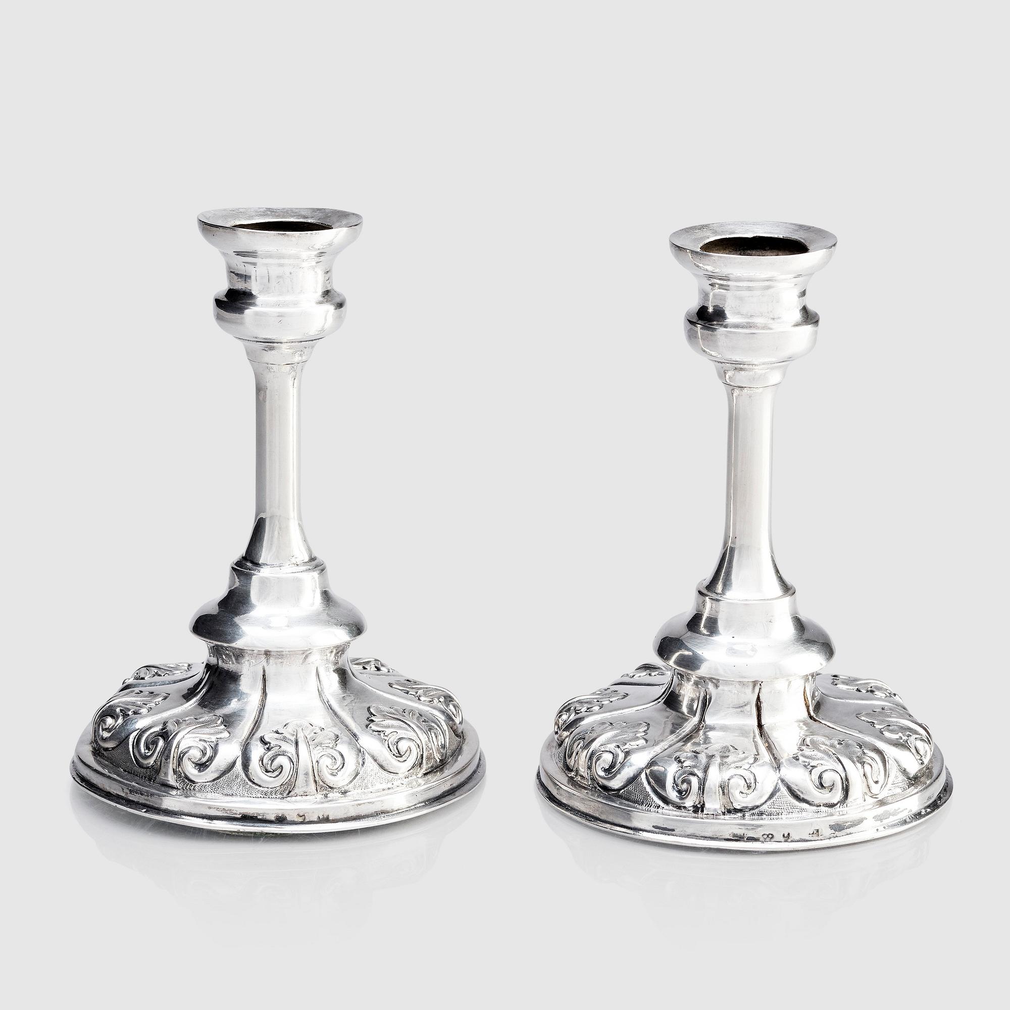 Ljusstakar, silver, ett par, otydlig mästarstämpel, möjligen Olof Pehr Hallberg, Norrköping (verksam 1832-1862).