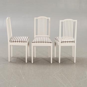 A set of six painted chairs around 1900.