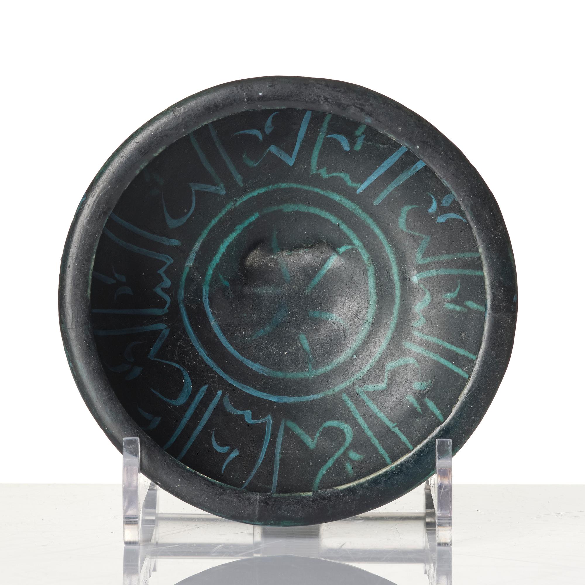 A Kashan, pottery bowl, Persia, 13th century.