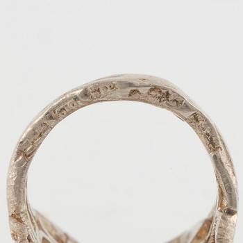 Lars Arby, four rings, sterling silver and enamel, Gothenburg 1966 and 1976.