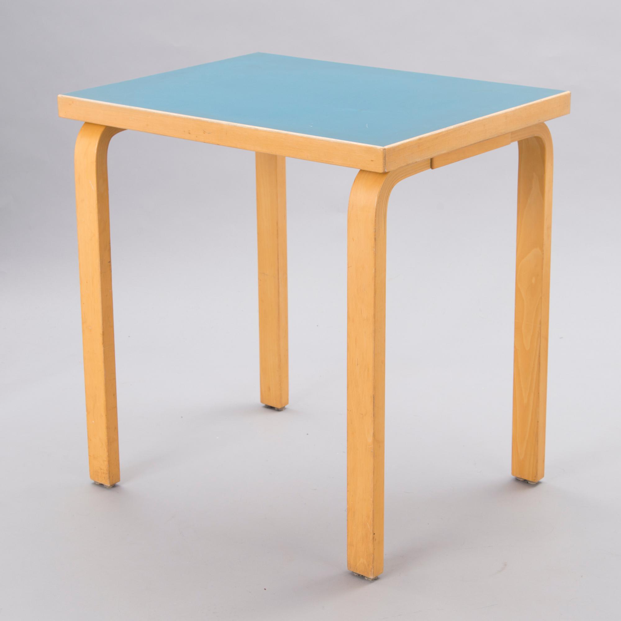 A mid-20th Century table, Artek.