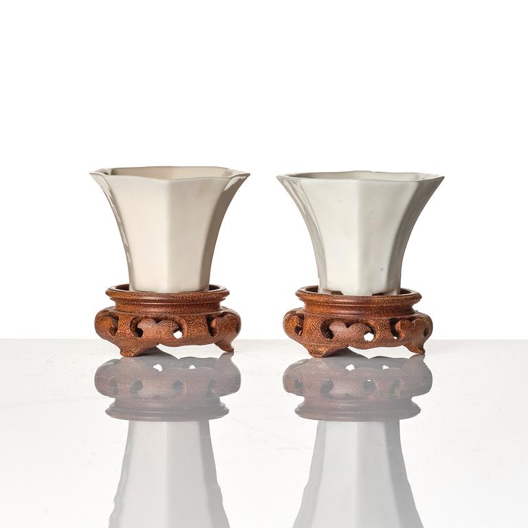 A set of two blanc-de-chine libation cups, Qing dynasty, Kangxi (1662-1722).