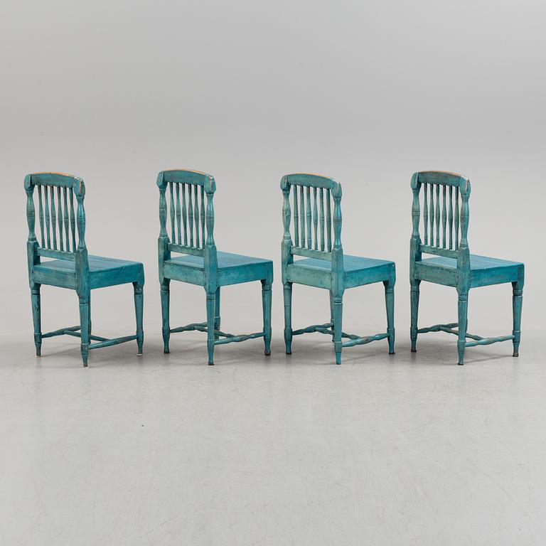 A set of four 19th century folk art chairs.