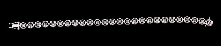 ARMBAND, 18 k vitguld, briljantslipade diamanter tot ca 1.21 ct, navettslipade safirer tot ca 11.16 ct.