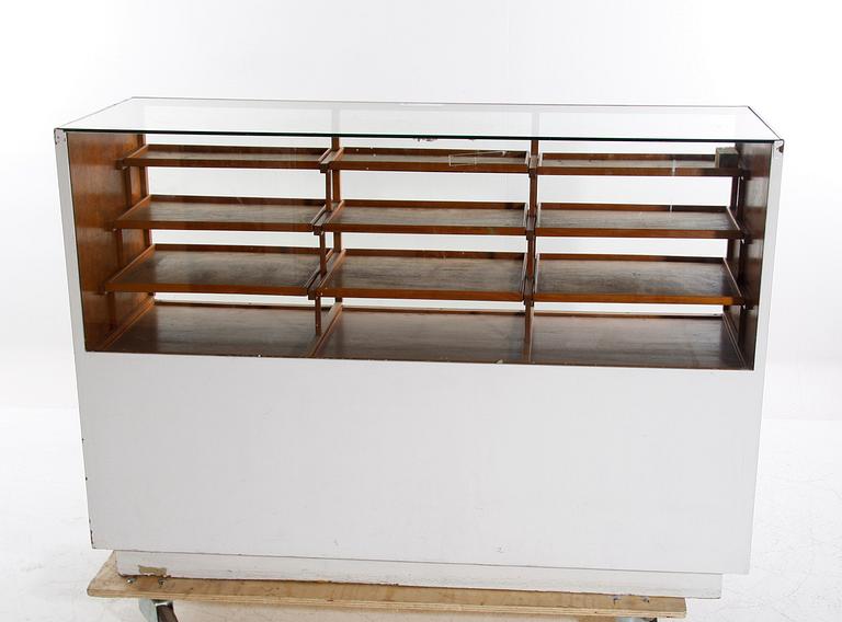 BUTIKSDISK, 1900-tal.