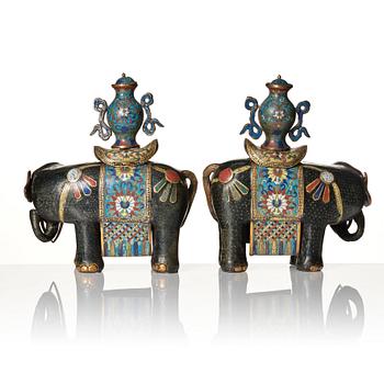 A pair of Chinese cloisonné and chamleve caparisoned elephants, Qing dynasty, 18th/19th Century.