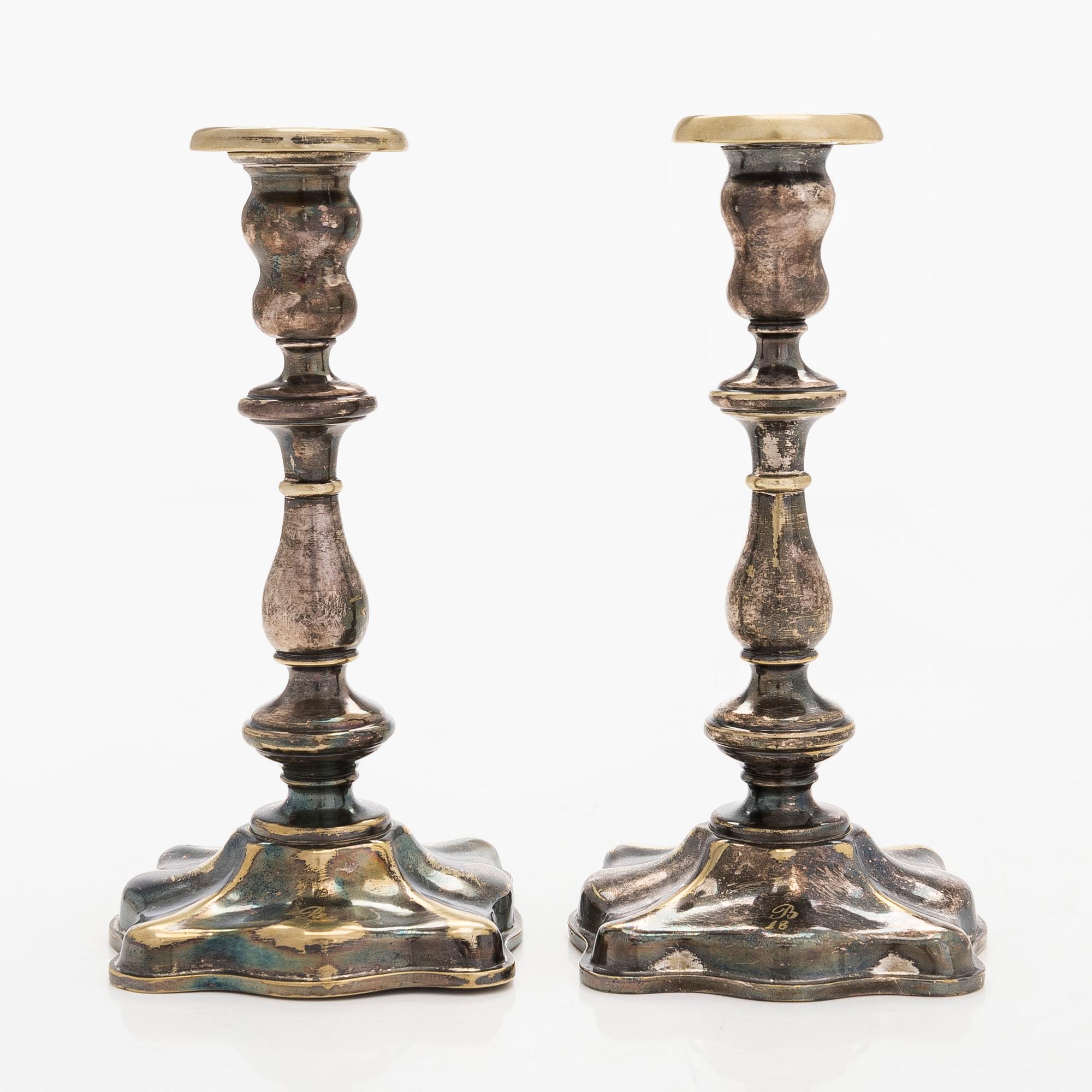 A pair of Fraget silver-plated candelsticks, Warsaw 1851-59.