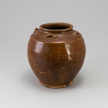 A south east asian pottery urn 18/19th century.