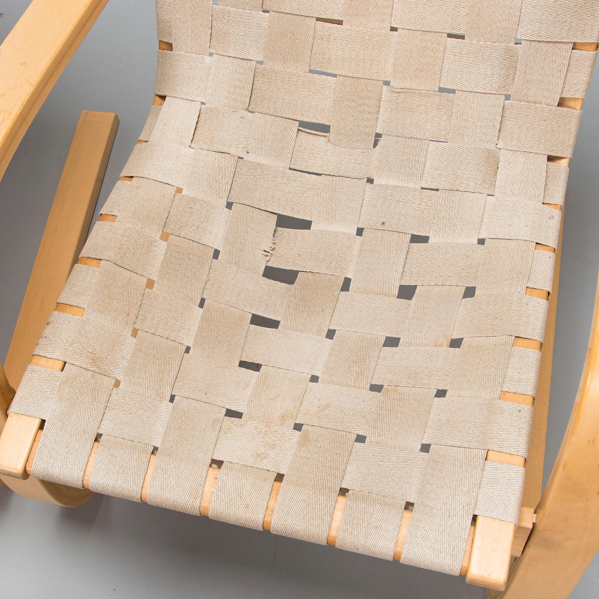 Alvar Aalto, a pair of late 1900s '406' armchairs for Artek.
