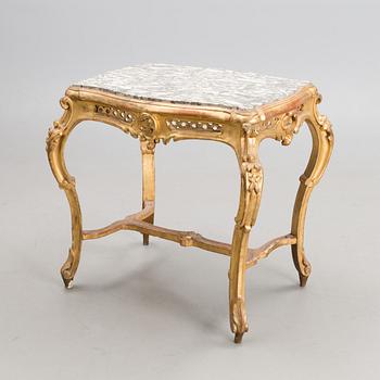 A late 19th century table in rococo style.