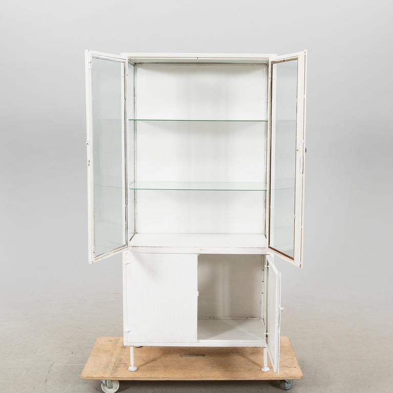 A mid 1900s metal medicine cabinet.