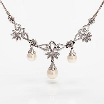 An 18K white gold necklace with cultured pearls and diamonds ca. 0.04 ct in total. Finnis import marks 1963.