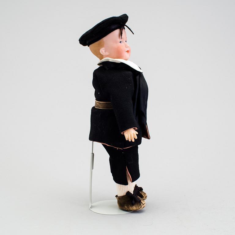 A bisque headed character doll 500 by Armand Marseille, Germany, ca 1910.