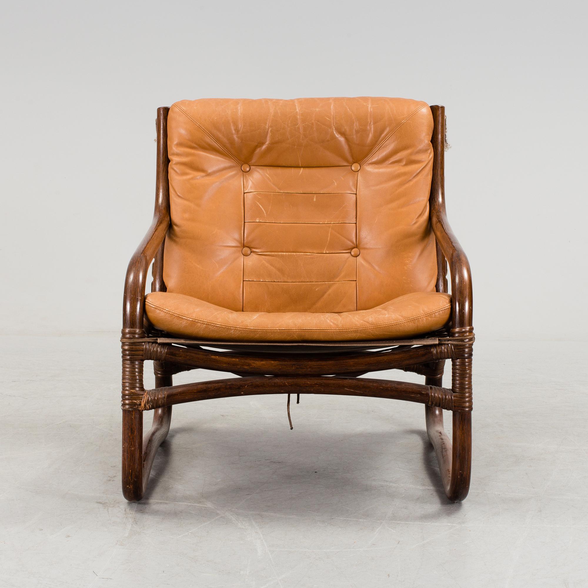 A bamboo and leather armchair, 1970's.