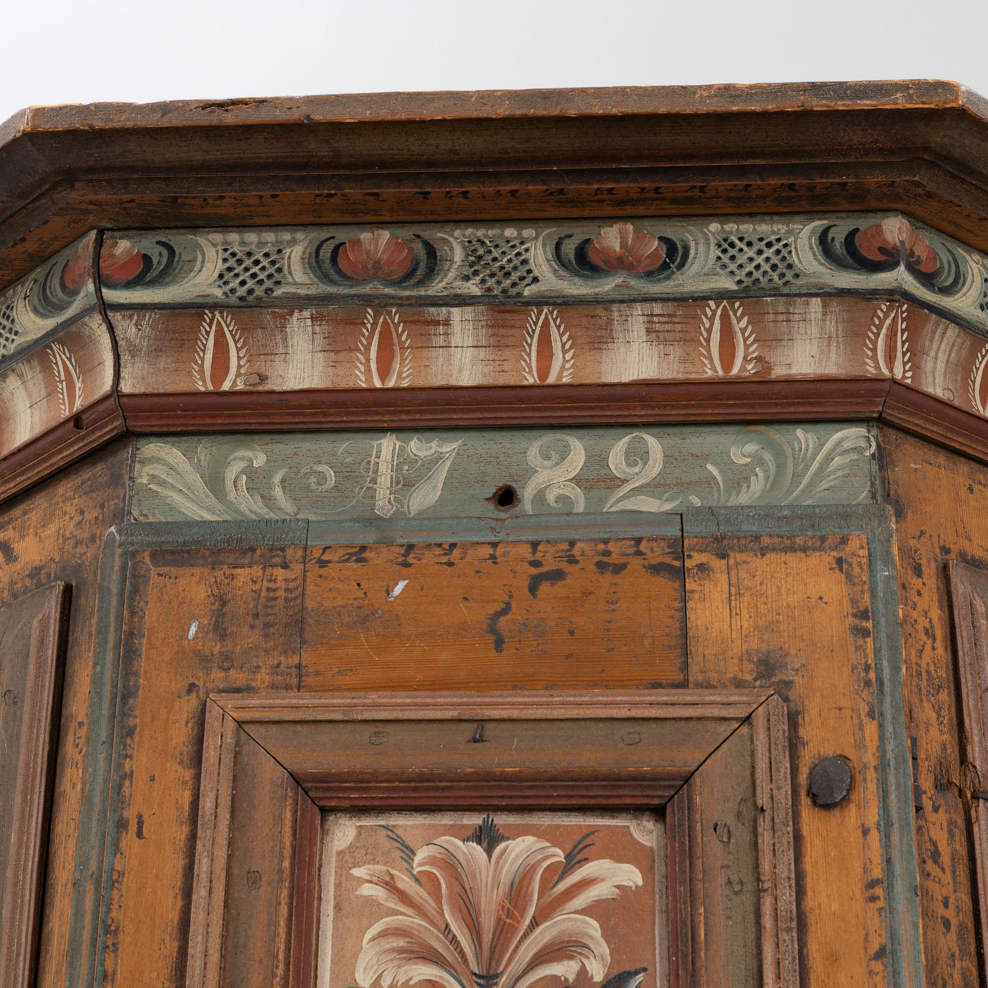 A Swedish cabinet, dated 1782.