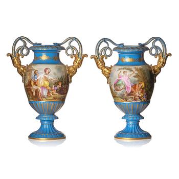 184. A pair of large porcelain urns, Sèvres like mark, around 1900.