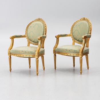 A pair of armchairs, Gustavian style, early 20th century.