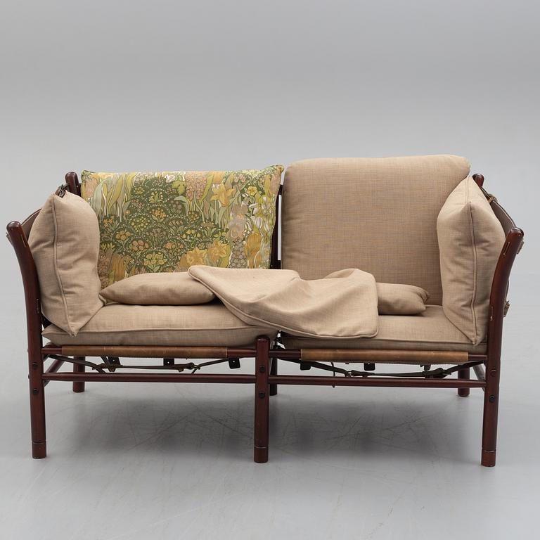 ARNE NORELL, an 'Ilona' stained wood and leather sofa fron Norell Möbel, Aneby, 1960's/70's.