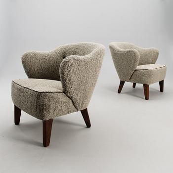 A pair of armchairs from the mid 20th century.