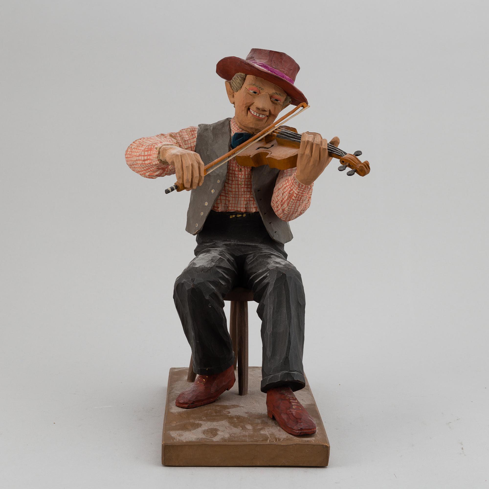 HERMAN ROSELL, a painted wooden sculpture.