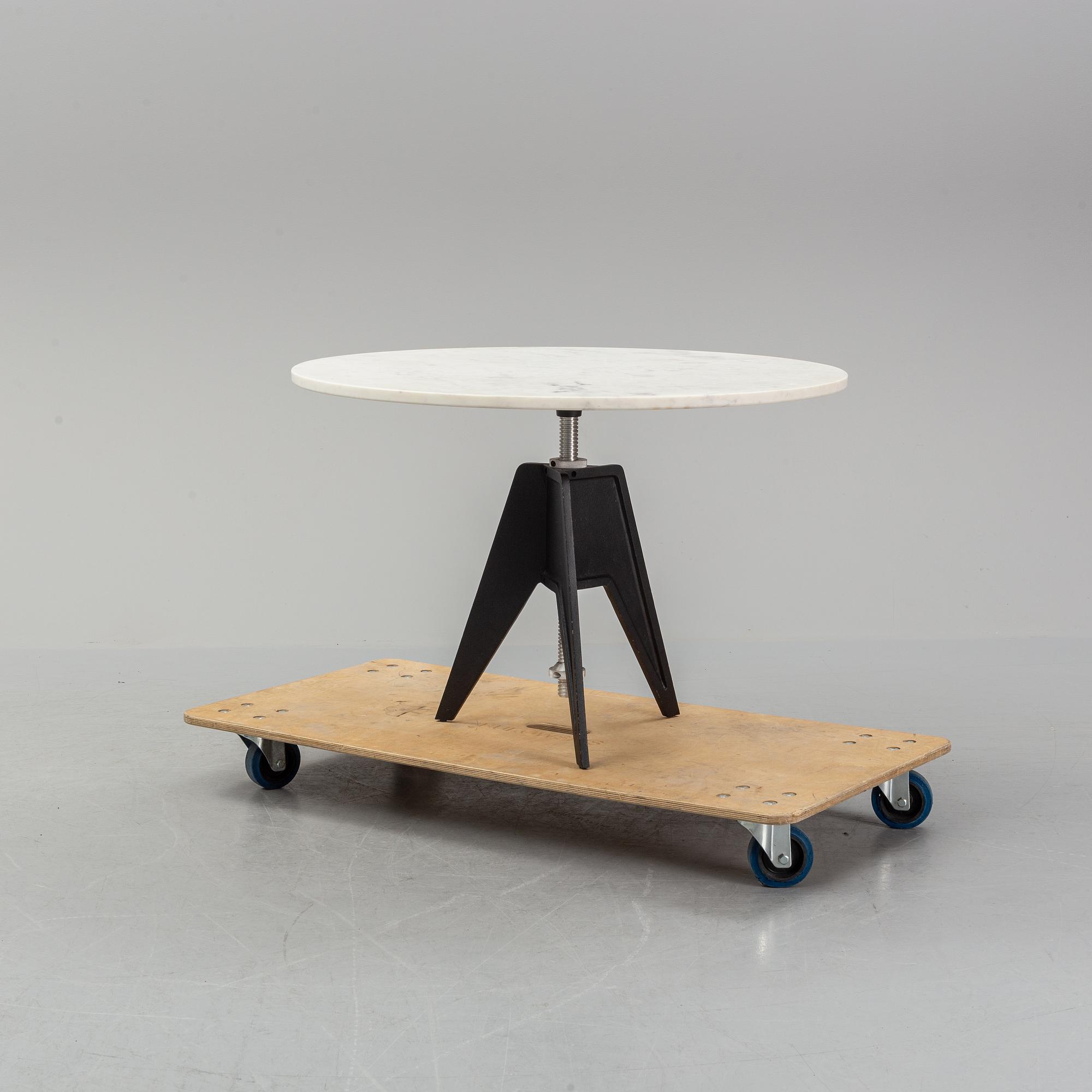 A Tom Dixon Screw Café Table.