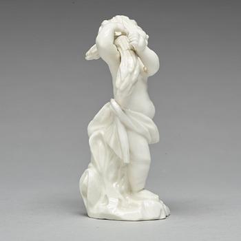 FIGURIN, porslin. Marieberg, 1700-tal. "Putto med sädeskärve".