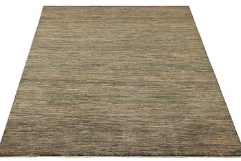 An Ushak design carpet, a. 302 x 192 cm.