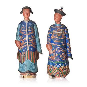 A pair of Chinese Export polychrome painted nodding head figures, Qing dynasty, early 19th Century.