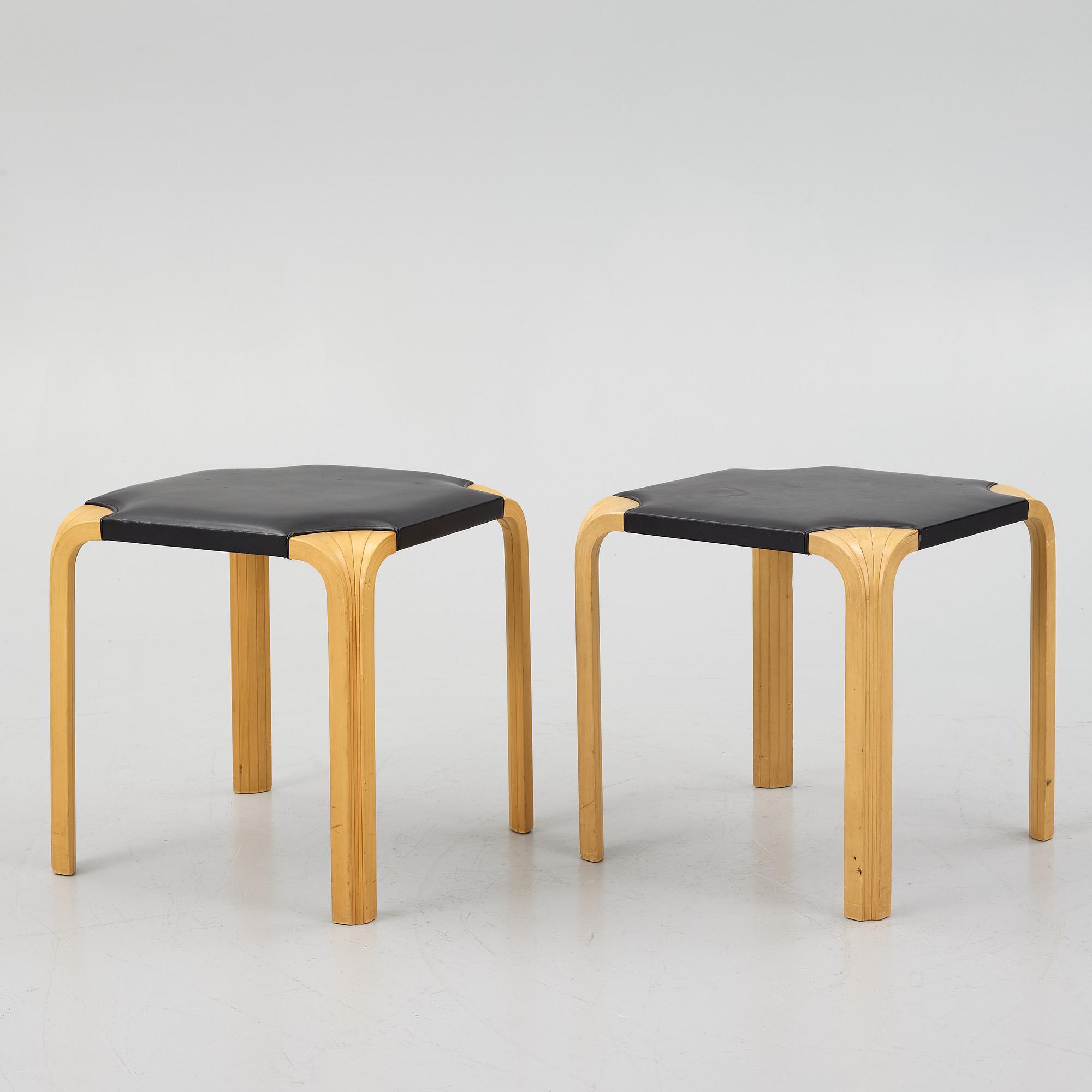 Alvar Aalto, a pair of 'X601' stool for Artek, later half of the 20th century.