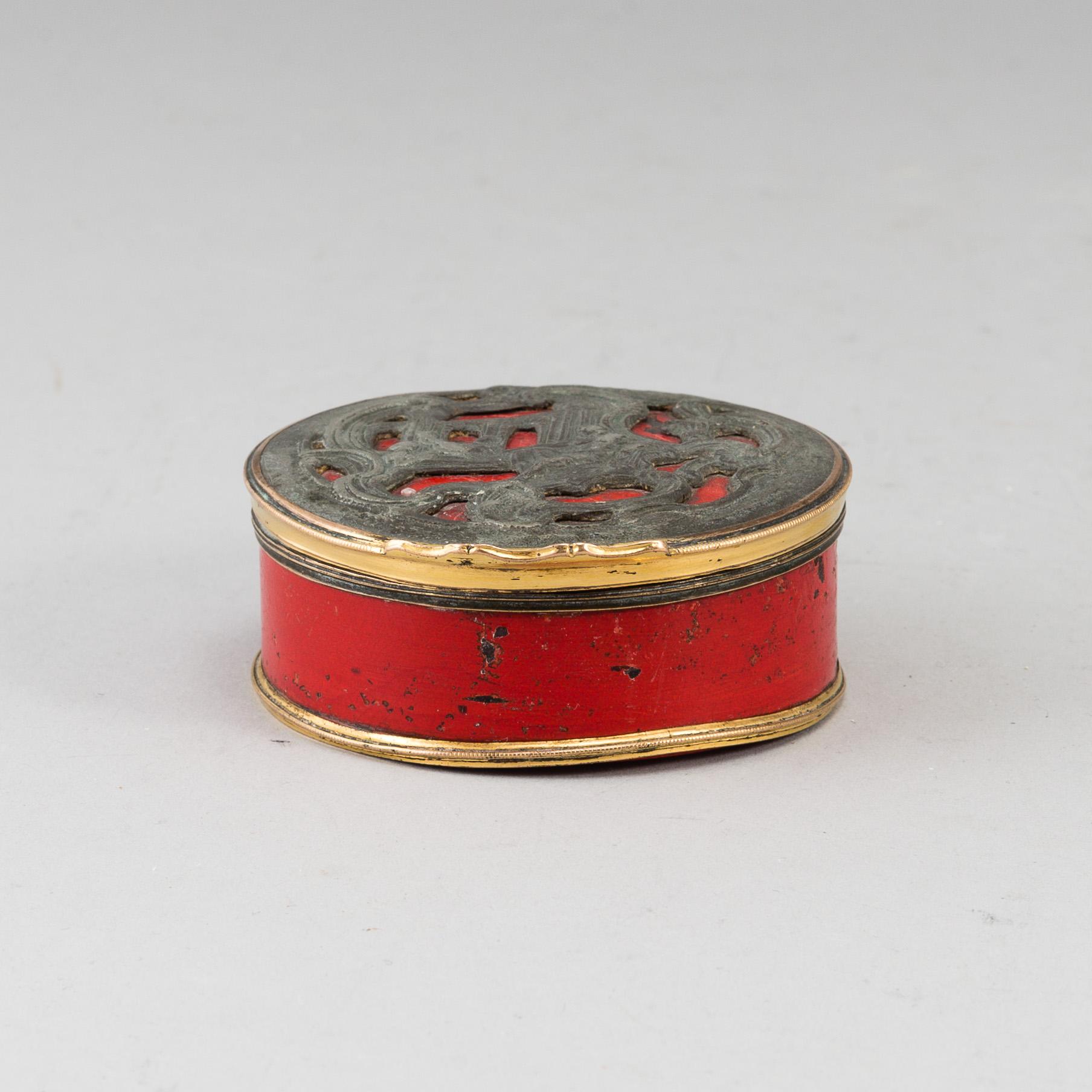 A mid 18th century lacquer rococo box.