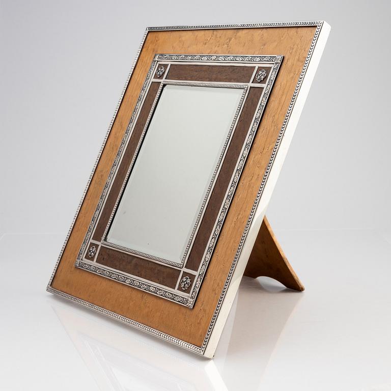 A large Bolin silvermounted natural and stained birch frame, Moscow 1912-1917, by Court Jeweller Wilhem Bolin.