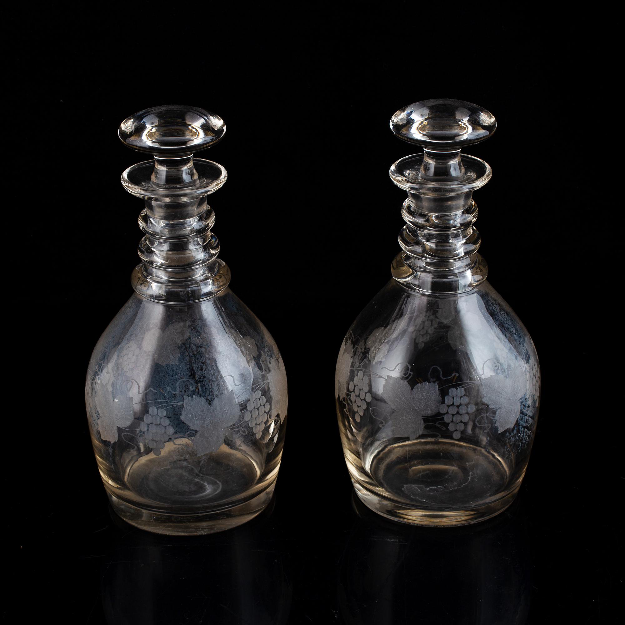 A pair of mid 19th century glass decanters and stoppers.