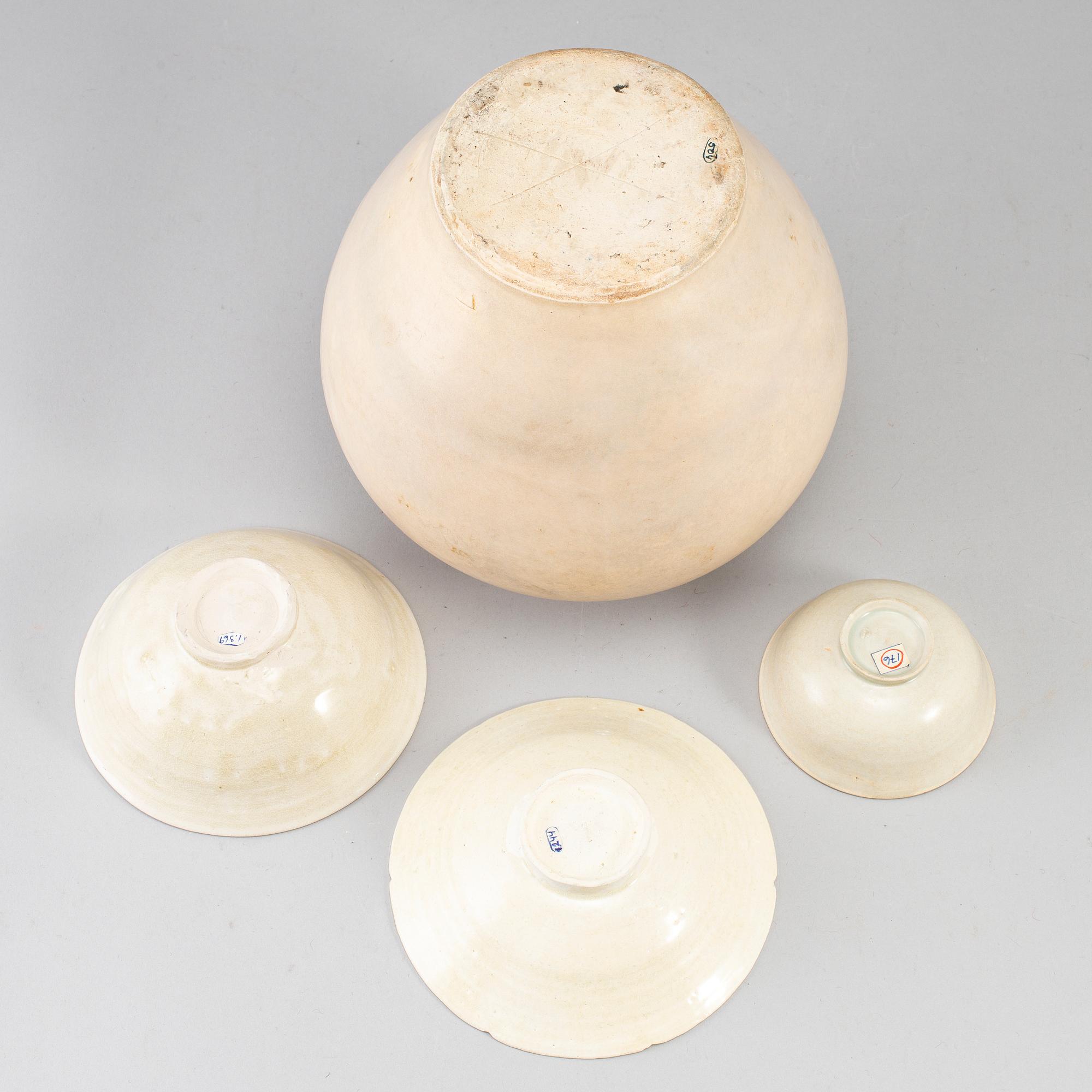 A group of white glazed South East Asian Ceramics, 20th Century or earlier. (4 pieces).