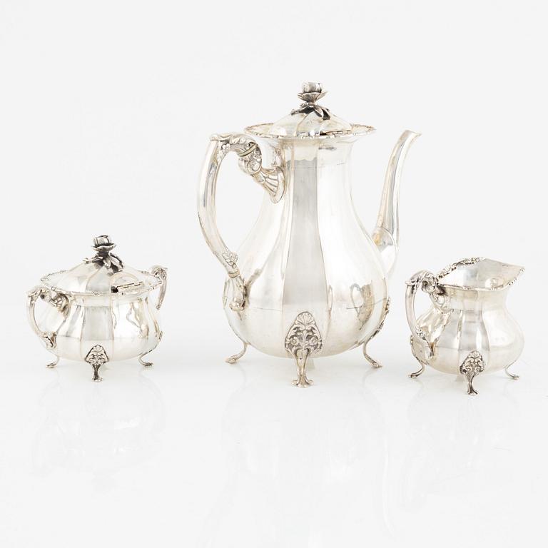 A silver coffee pot, a sugarbowl and a creamer, Swedish import marks, 20th Century.