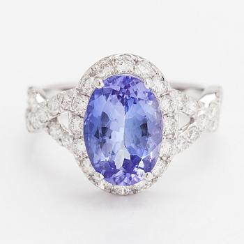 An 18K white gold ring with a ca. 3.45 ct tanzanite and diamonds ca 1.53 ct in total. IGI certificate.