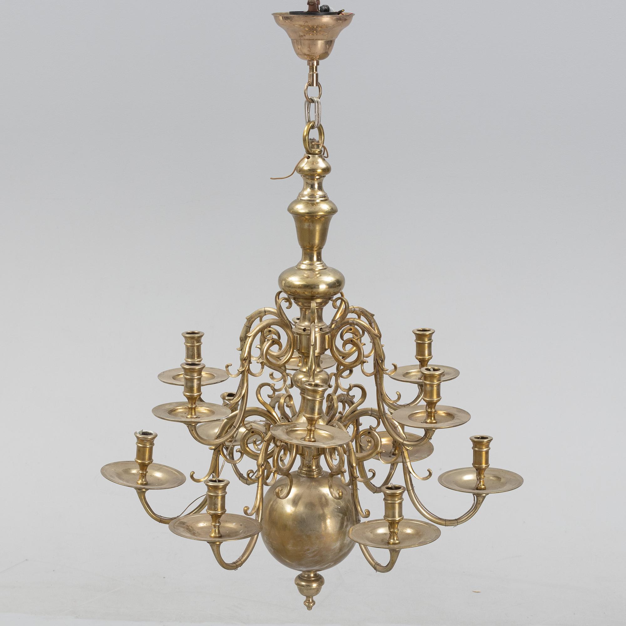 A brass Baroque style chandelier, 20th Century.