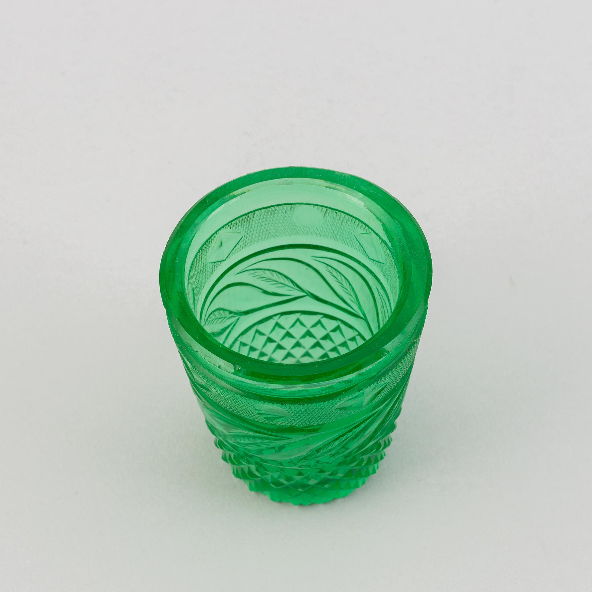 A green tinted cut vodka glass, Russia, Imperial glass manufactory, St Petersburg, 19th Century.