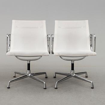 A pair of 'EA 108' desk chairs by Charles & Ray Eames for Vitra.