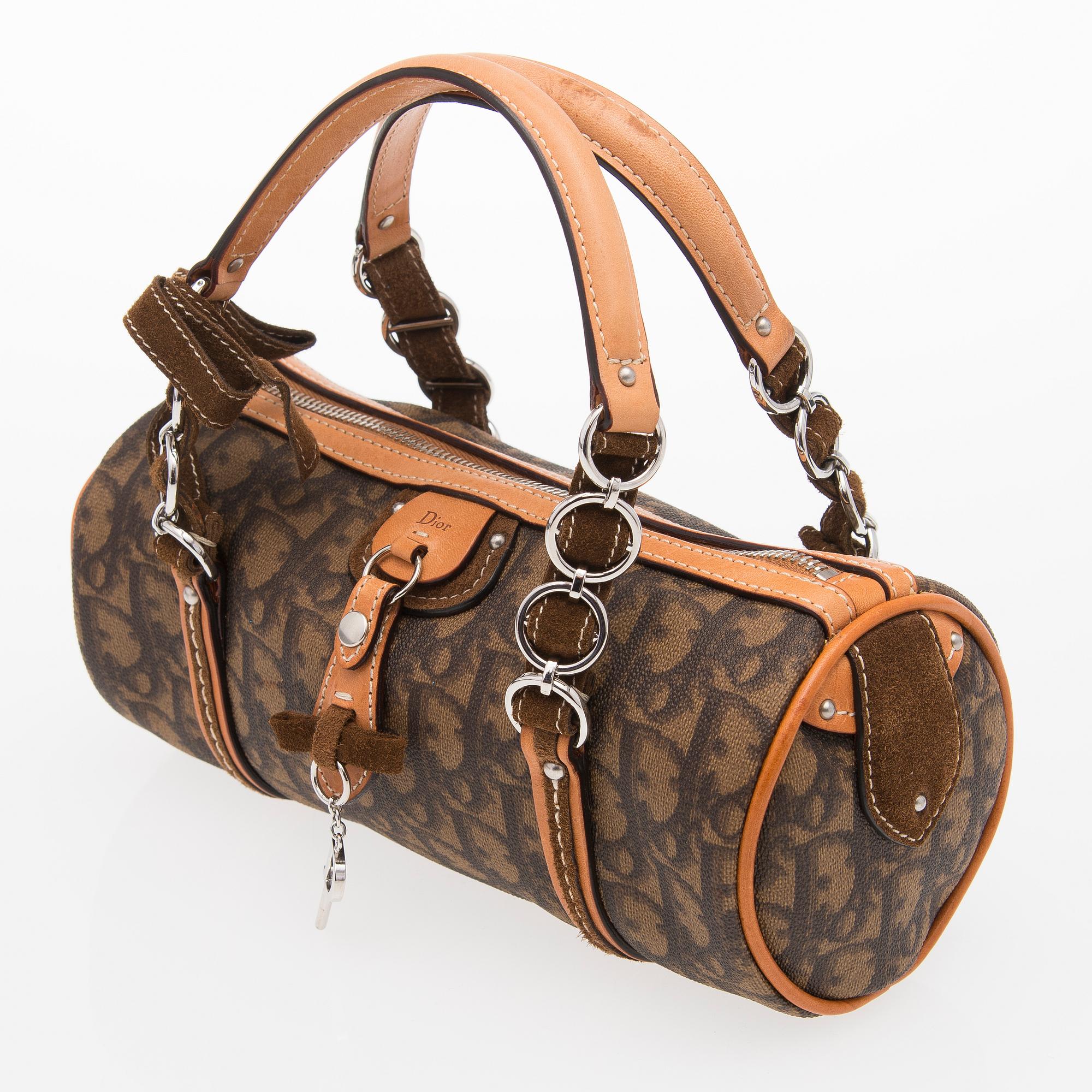 A Monogram Trotter Romantique Round Handbag.