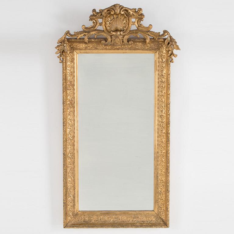 a rococo-style mirror from the late 19th century.