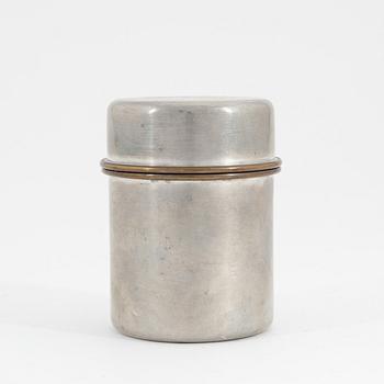 Estrid Ericson, A pewter and brass jar with cover, Firma Svenskt Tenn, Stockholm, 1957.