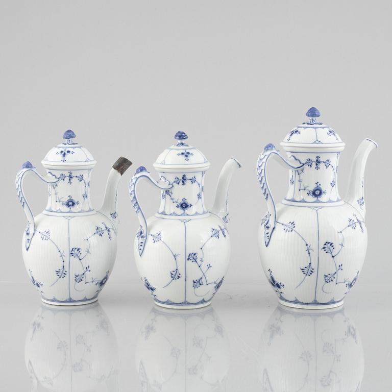 A group of five 'Blue Fluted Plain' porcelain Coffee Pots, Royal Copenhagen, models 46, 47, 48, 49, 1898-1923 and later.