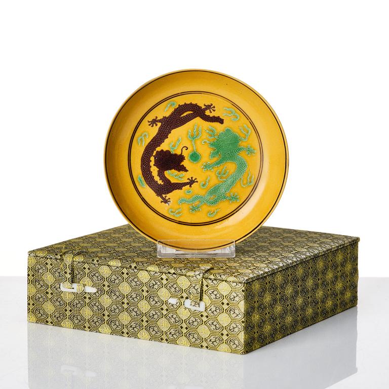 A yellow ground dragon dish, Qing dynasty with Guangxu six character mark and period (1875-1908).