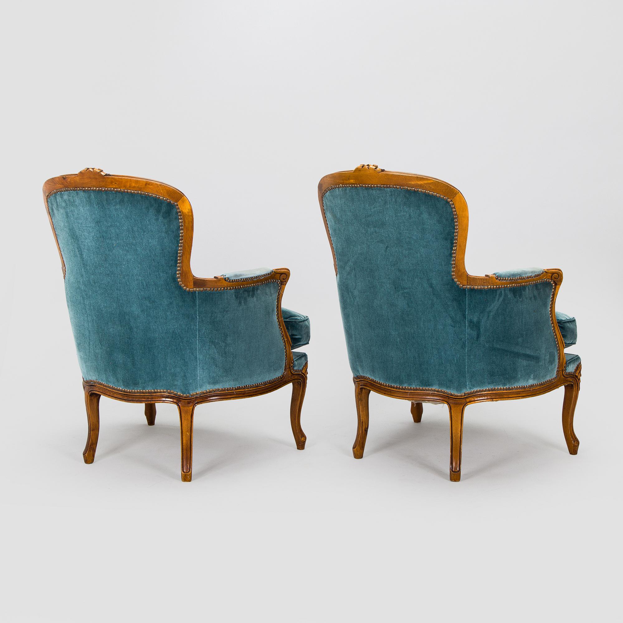 A pair of Louis XV style armchairs, mid-20th century.