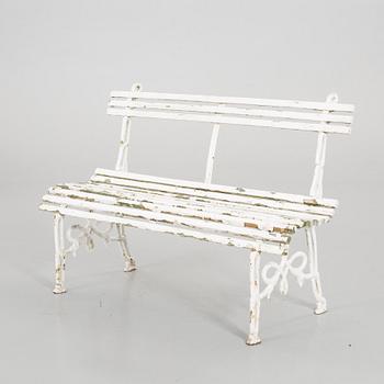 A WROUGHT IRON GARDEN BENCH, beginning of the 20th century.