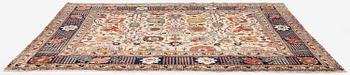 A semi-antique Tabriz carpet, Northwest Persia, of Safavid 'Vase' design, c.328 x 242 cm.