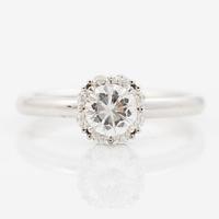Ring 18K white gold set with a brilliant-cut diamond, accompanied by an IGI report.