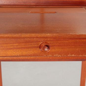 a table with mirror "Birgitta" veneered with teak designed by Carl Malmsten for Bodafors Möbelfabrik,