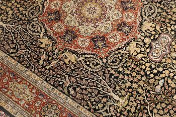 A oriental silk carpet, 303 x 201 cm.